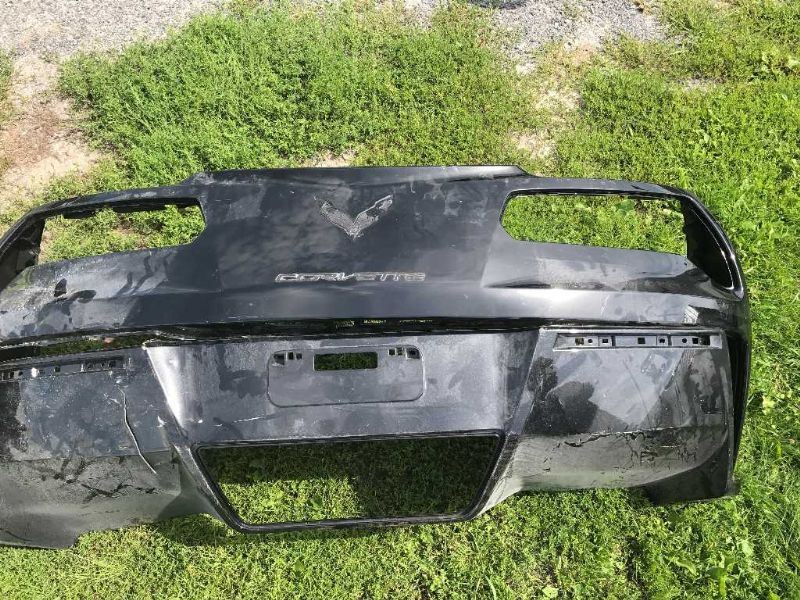 Rear bumper cover used genuine OEM Mitsubishi Montero 2003-2006