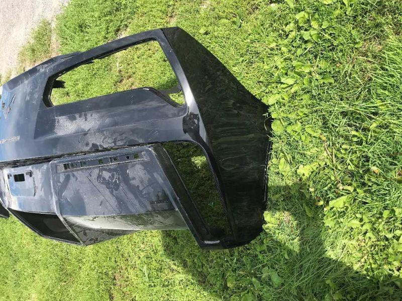 Rear bumper cover used genuine OEM Mitsubishi Montero 2003-2006