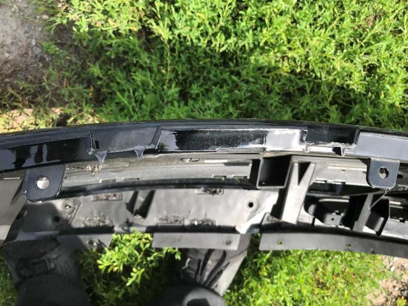Rear bumper cover used genuine OEM Mitsubishi Montero 2003-2006