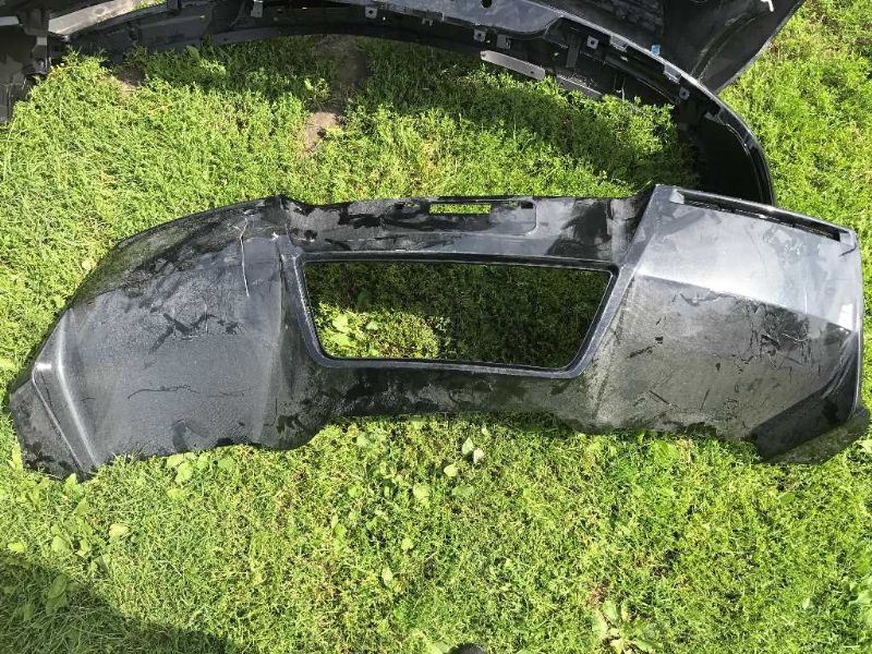 Rear bumper cover used genuine OEM Mitsubishi Montero 2003-2006