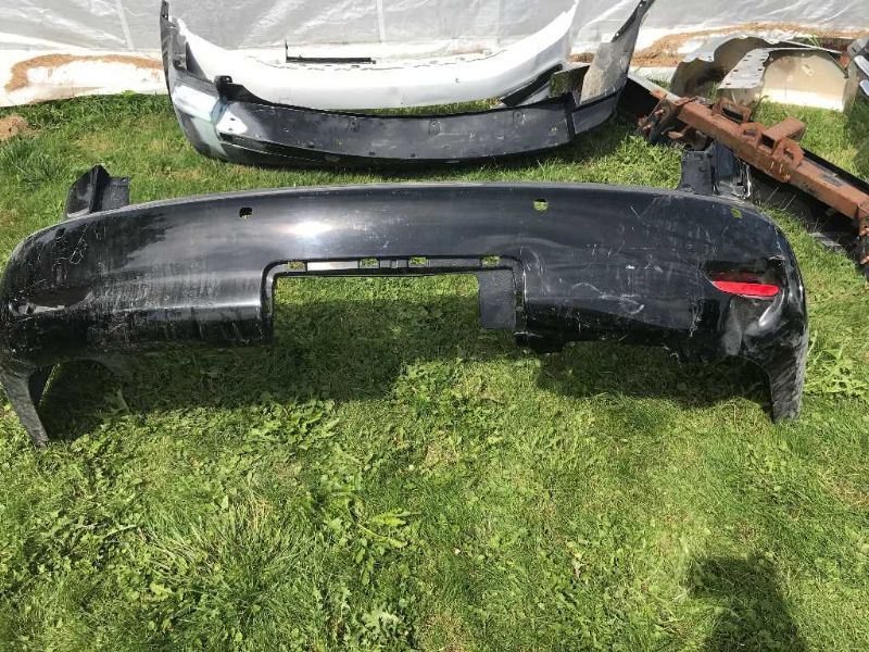 Rear bumper cover used genuine OEM Infiniti QX56 2011-2012