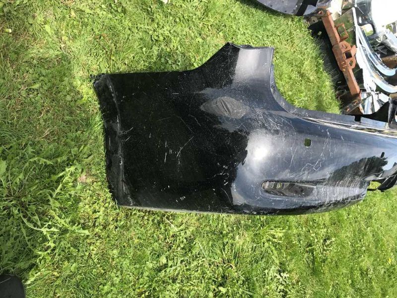 Rear bumper cover used genuine OEM Infiniti QX56 2011-2012