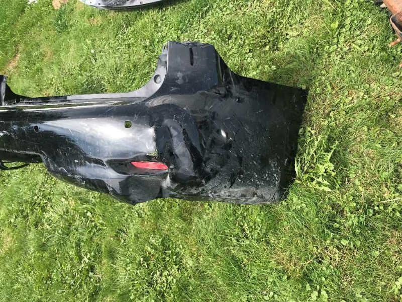 Rear bumper cover used genuine OEM Infiniti QX56 2011-2012