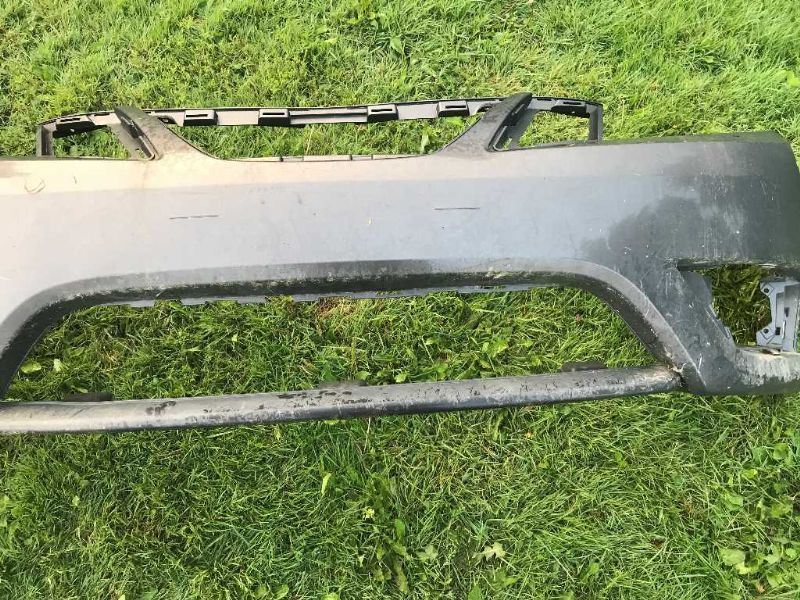 Defensa (parachoques) delantera usada original (OEM) Saab Saab 9-3 2008-2011