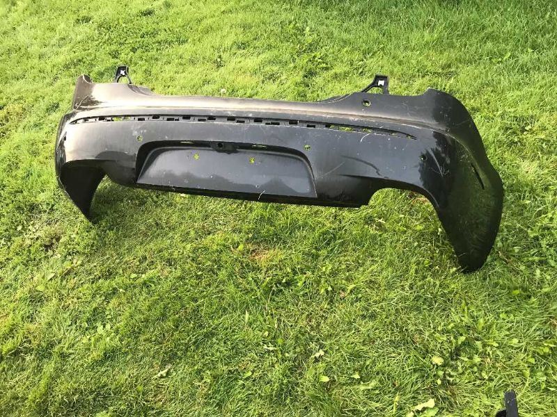 Rear bumper cover used genuine OEM Jaguar XJ 2011-2015