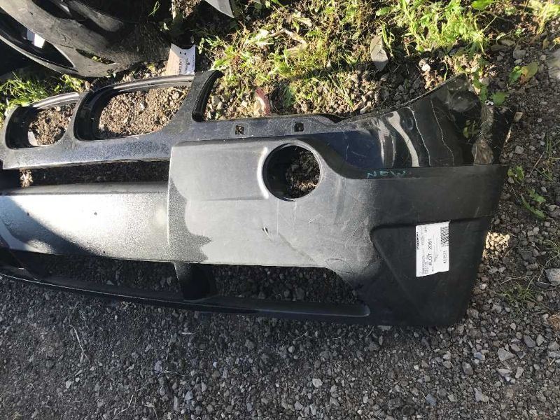 Front bumper cover used genuine OEM BMW X3 2004-2006