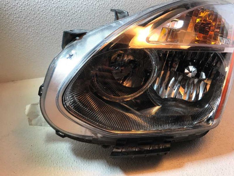 Faro izquierdo usado original (OEM) Nissan Rogue 2009-2010