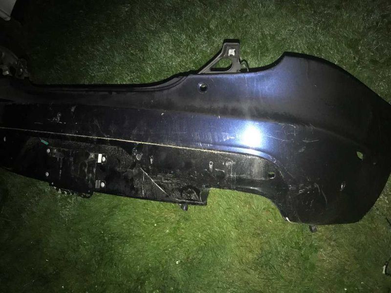 Rear bumper cover used genuine OEM Jaguar XJ 2011-2015