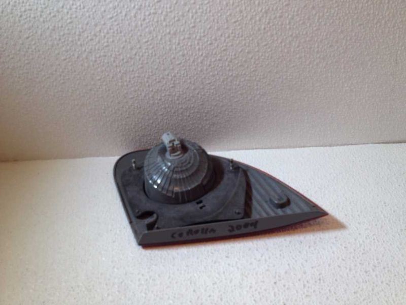 Left back up lamp assembly used genuine OEM Toyota Corolla 2003-2008