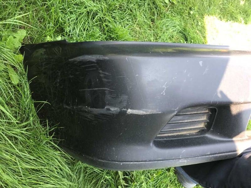 Front bumper cover used genuine OEM Acura TL 1999-2001
