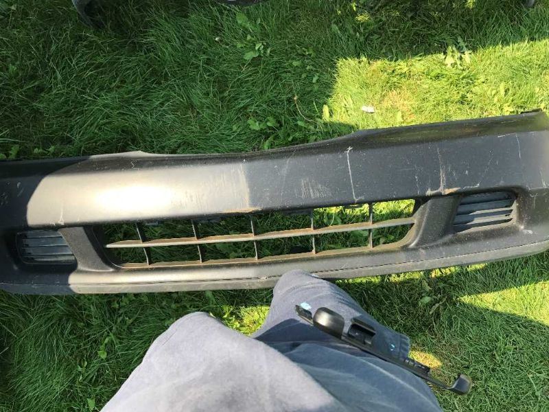 Front bumper cover used genuine OEM Acura TL 1999-2001