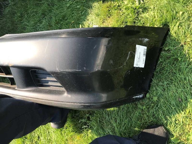 Front bumper cover used genuine OEM Acura TL 1999-2001