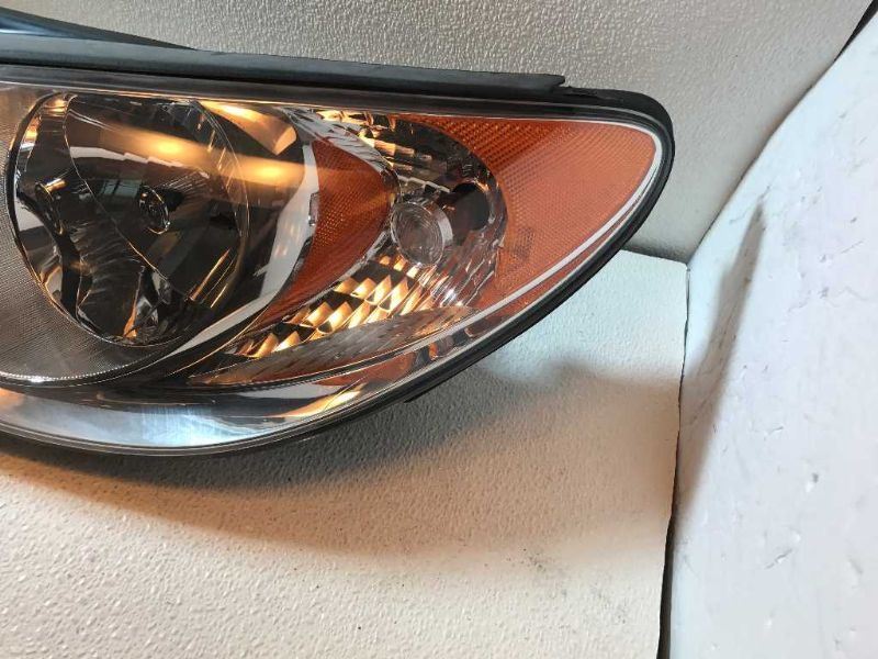 Left headlamp assembly composite used genuine OEM Hyundai Elantra 2007-2009