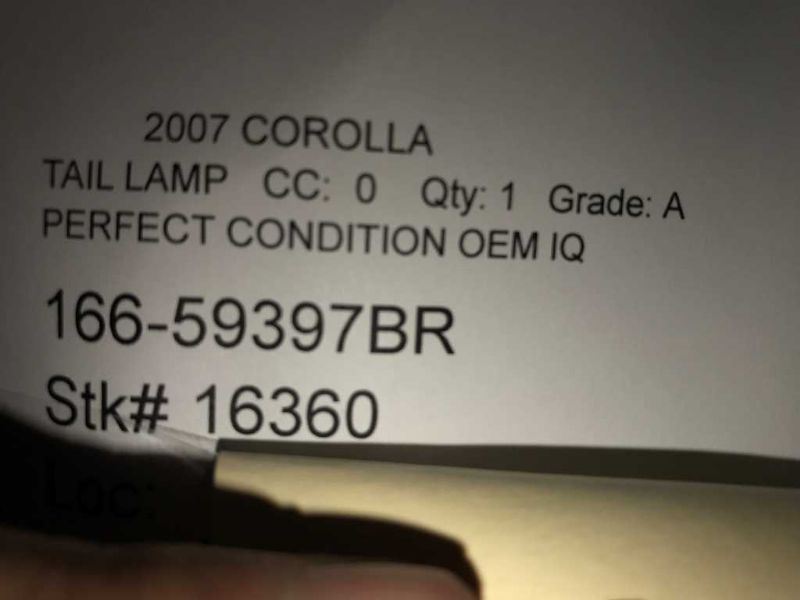 Right taillamp assembly used genuine OEM Toyota Corolla 2003-2004