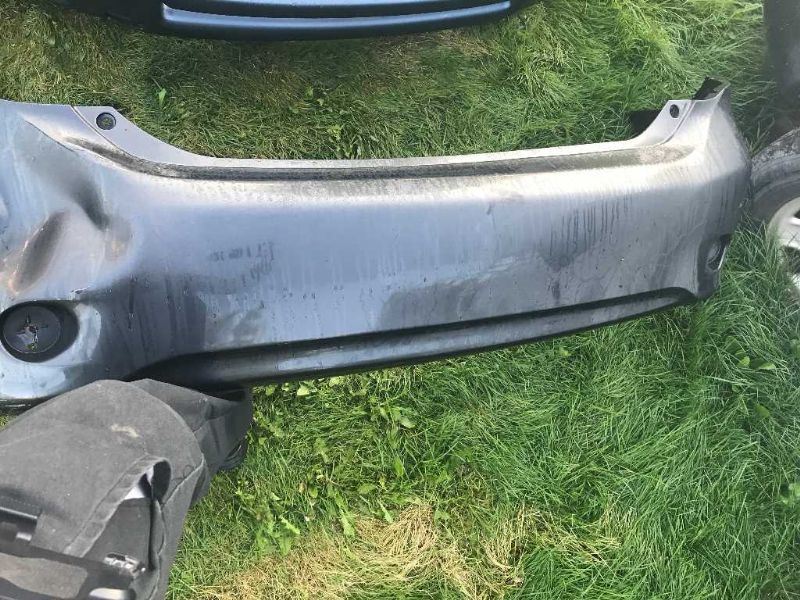 Rear bumper cover used genuine OEM Toyota Corolla 2009-2010