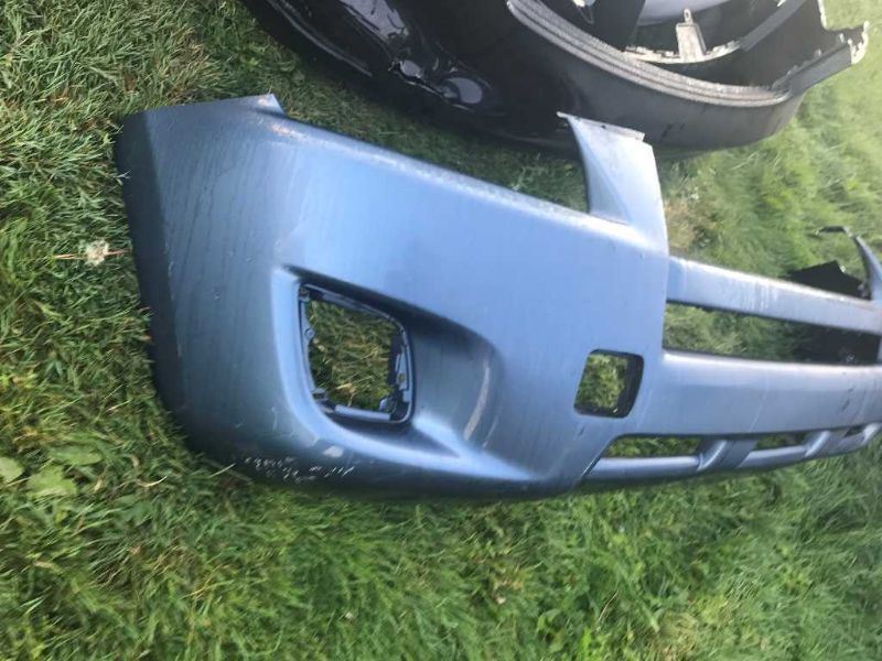 Rear bumper cover used genuine OEM Toyota RAV4 2009-2012