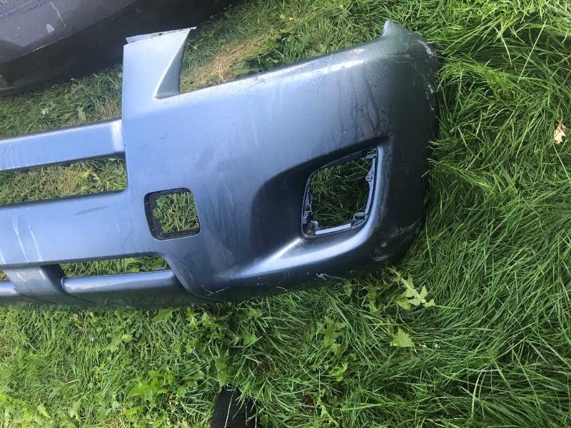 Rear bumper cover used genuine OEM Toyota RAV4 2009-2012