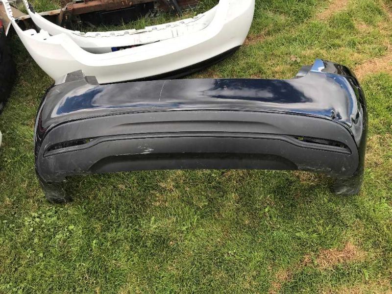 Defensa (parachoques) trasera usada original (OEM) Chrysler 200 2015-2017