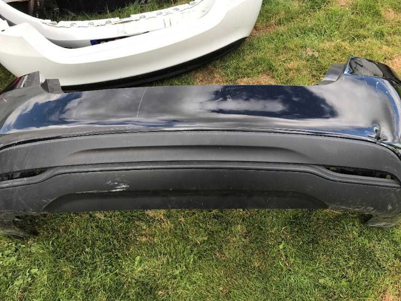 Defensa (parachoques) trasera usada original (OEM) Chrysler 200 2015-2017