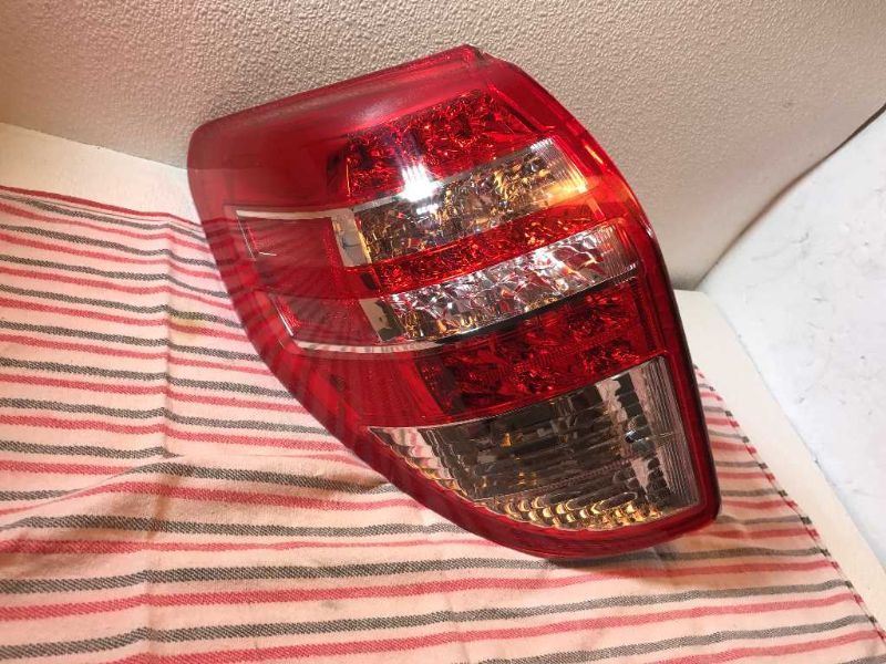 Left taillamp assembly used genuine OEM Toyota RAV4 2009-2012