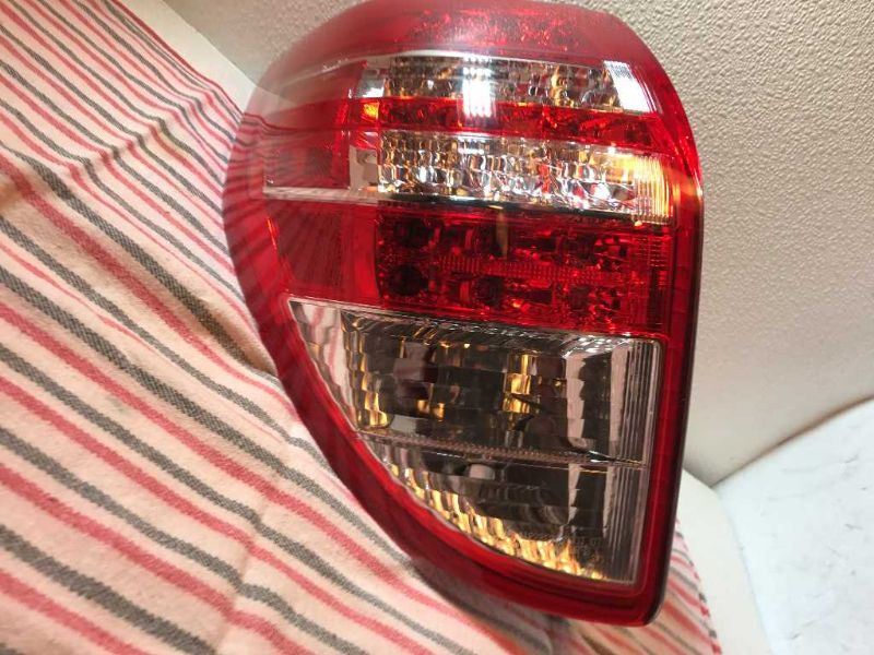 Left taillamp assembly used genuine OEM Toyota RAV4 2009-2012