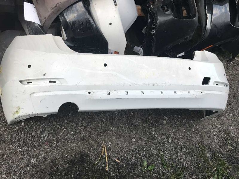 Rear bumper cover used genuine OEM BMW 320I 2012-2015