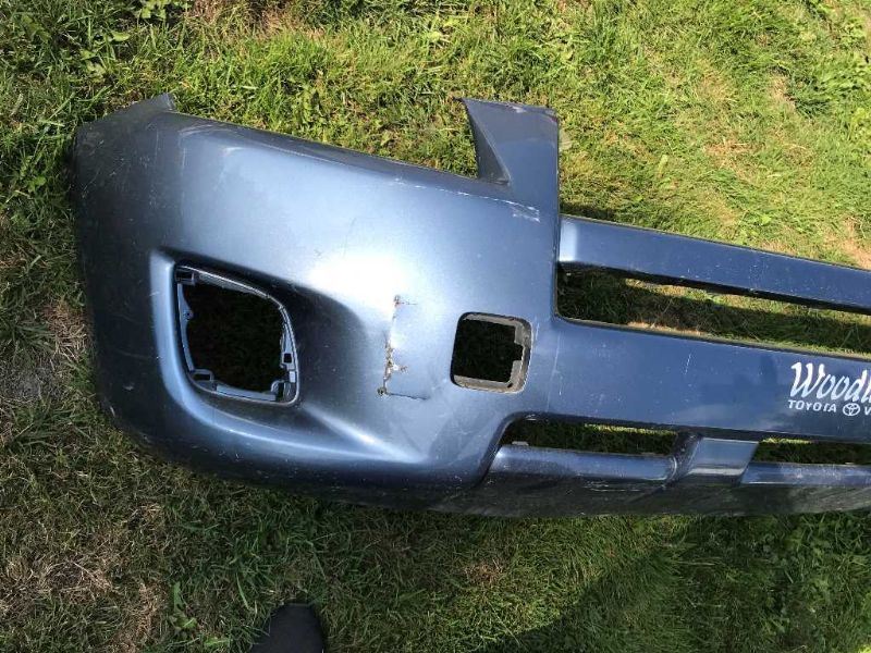 Front bumper cover used genuine OEM Toyota RAV4 2009-2012