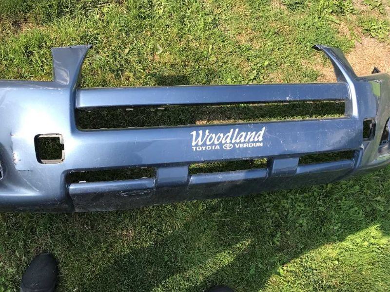 Front bumper cover used genuine OEM Toyota RAV4 2009-2012