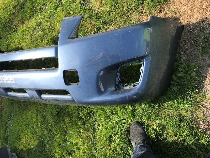 Front bumper cover used genuine OEM Toyota RAV4 2009-2012