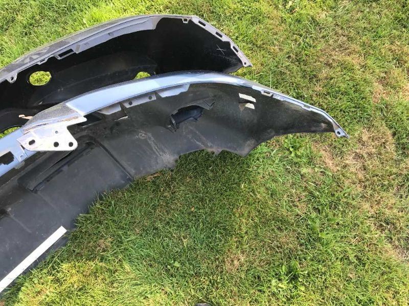 Front bumper cover used genuine OEM Toyota RAV4 2009-2012