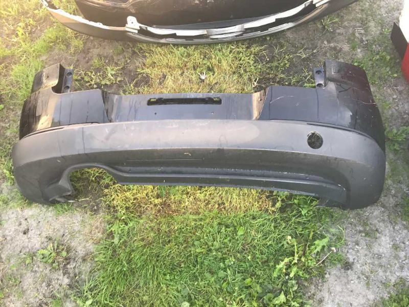 Defensa (parachoques) trasera usada original (OEM) Volkswagen Tiguan 2009-2011