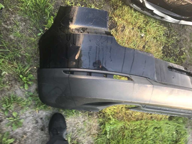 Defensa (parachoques) trasera usada original (OEM) Volkswagen Tiguan 2009-2011