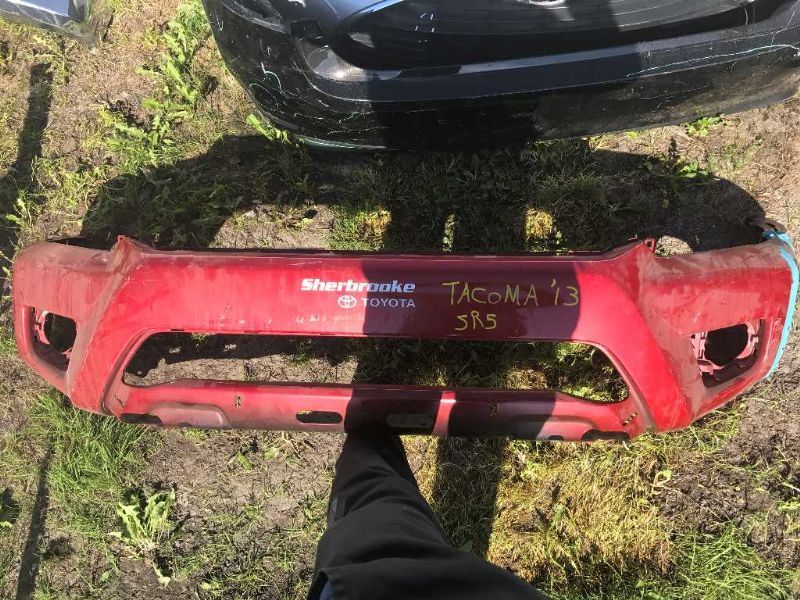 Front bumper cover used genuine OEM Toyota Tacoma 2012-2015