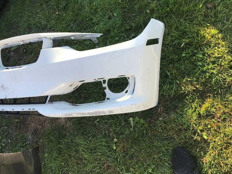 Front bumper cover used genuine OEM BMW 328I 2012-2015