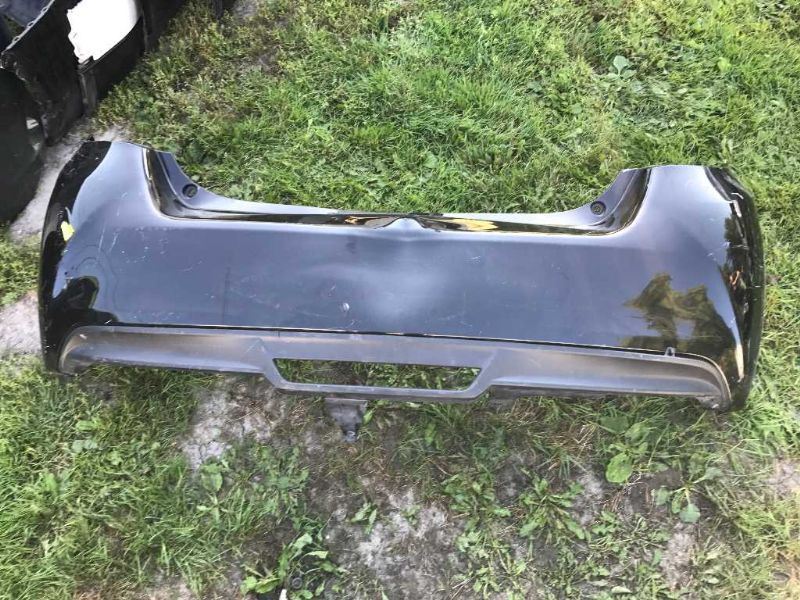 Defensa (parachoques) trasera usada original (OEM) Toyota Yaris 2015-2017