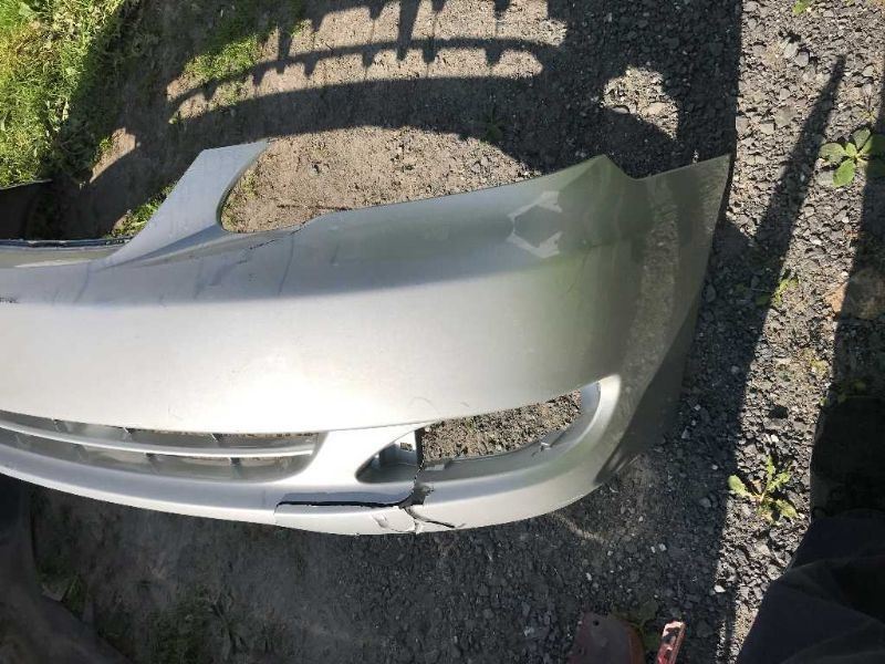 Front bumper cover used genuine OEM Toyota Corolla 2005-2008