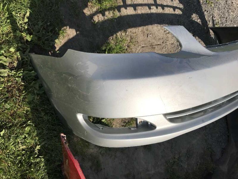 Front bumper cover used genuine OEM Toyota Corolla 2005-2008