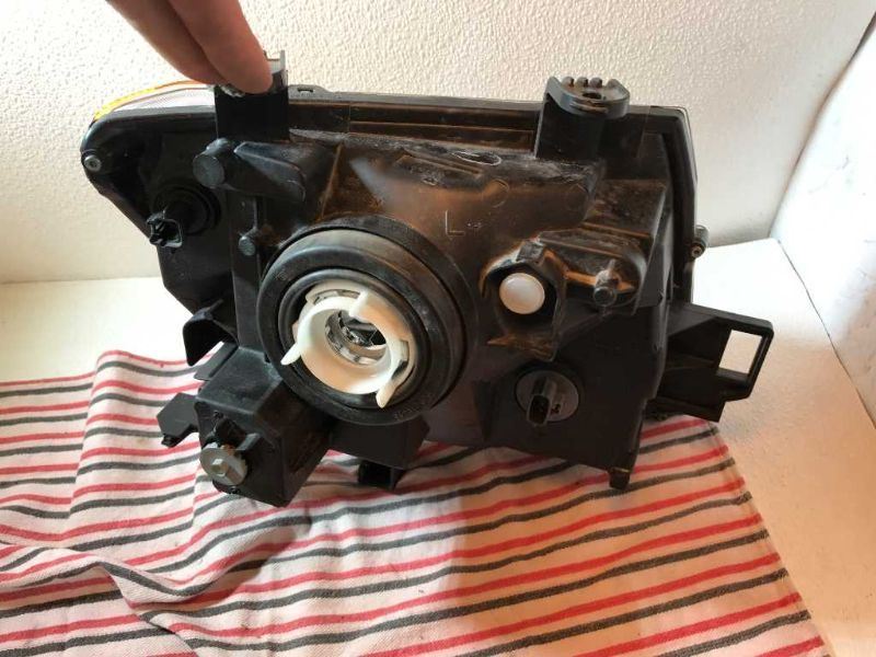 Faro izquierdo usado original (OEM) Nissan Xterra 2005-2015