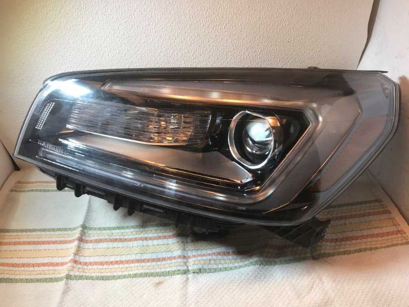 Headlamp Assembly used genuine OEM General Motors Acadia 2017-2019