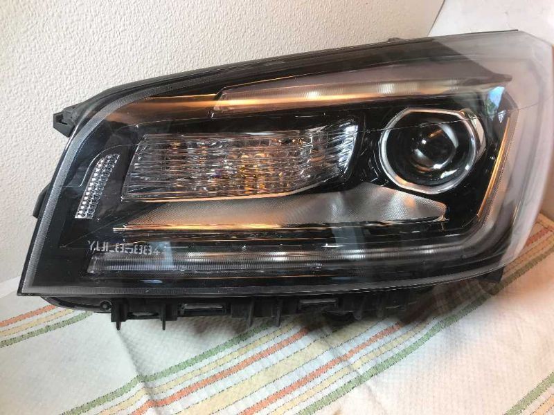 Headlamp Assembly used genuine OEM General Motors Acadia 2017-2019