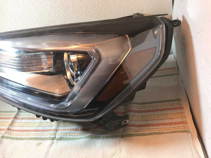 Headlamp Assembly used genuine OEM General Motors Acadia 2017-2019