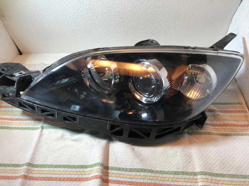 Faro izquierdo usado original (OEM) Mazda 3 2004-2009