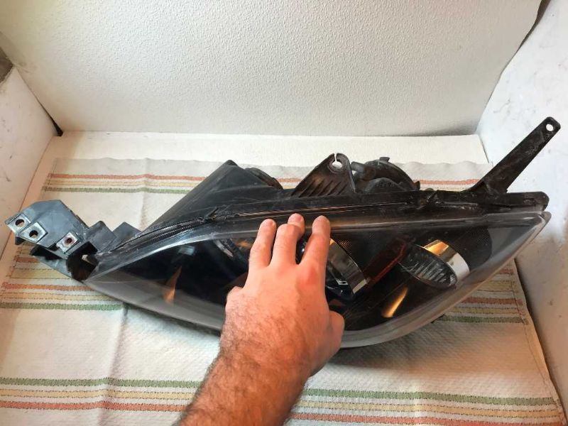 Faro izquierdo usado original (OEM) Mazda 3 2004-2009