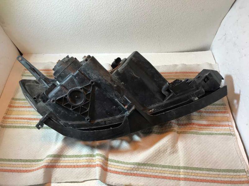 Faro izquierdo usado original (OEM) Mazda 3 2004-2009