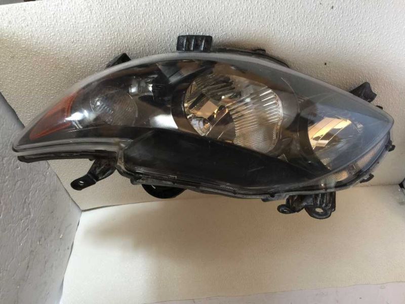 Left headlamp assembly composite used genuine OEM Toyota Corolla 2009-2010