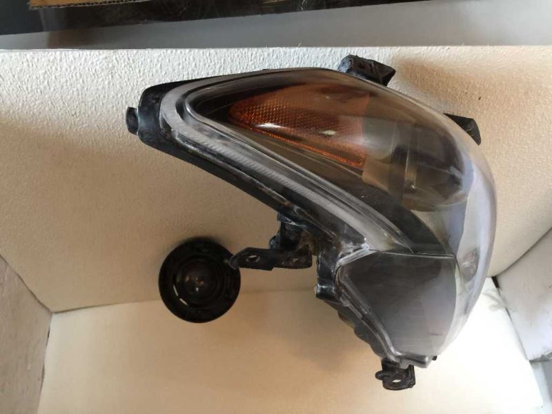 Left headlamp assembly composite used genuine OEM Toyota Corolla 2009-2010