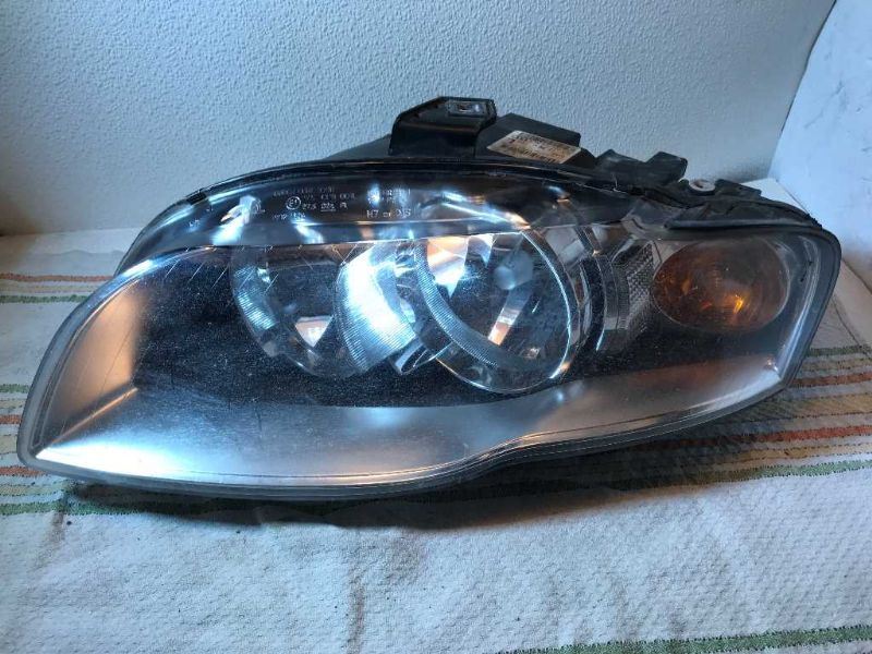 Left headlamp assembly composite used genuine OEM Audi A4 2005-2008