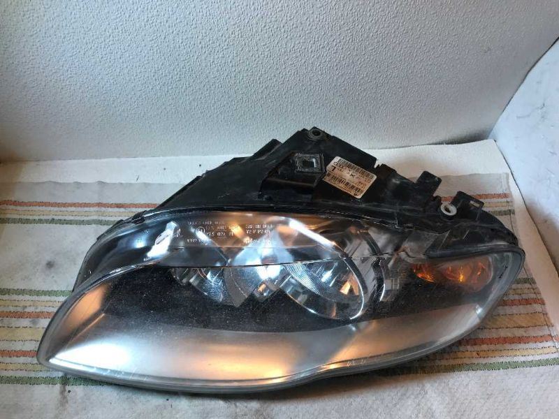 Left headlamp assembly composite used genuine OEM Audi A4 2005-2008