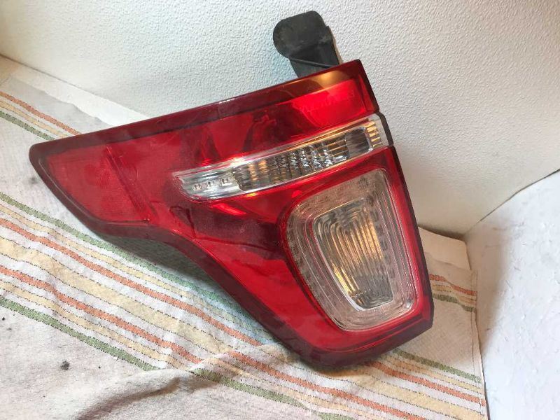 Left taillamp assembly used genuine OEM Ford Explorer 2011-2015
