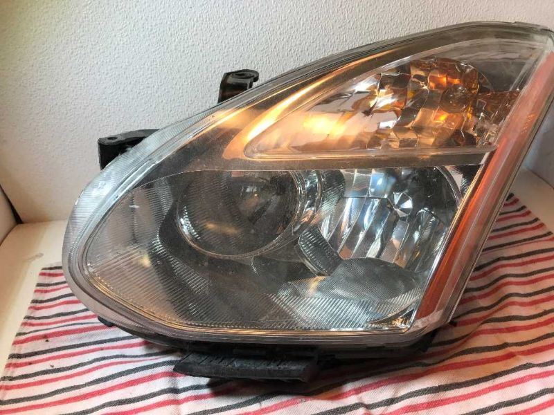 Faro izquierdo usado original (OEM) Nissan Rogue 2009-2010